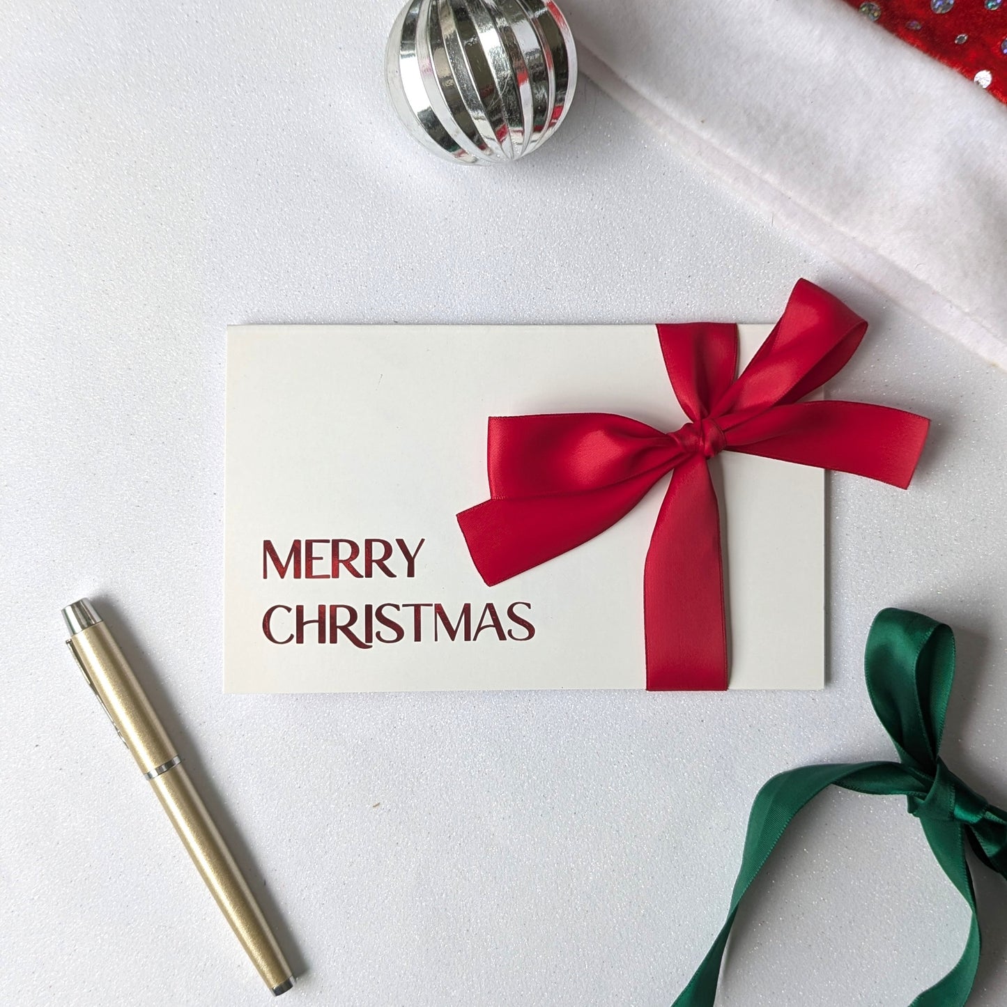Christmas Money gift envelope with red "Merry Christmas" and Red Satin Ribbon