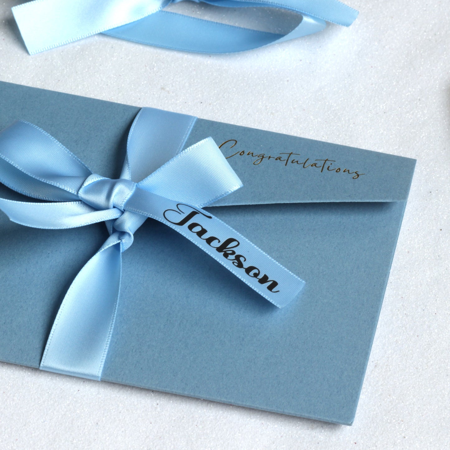 Next day delivery personalised card for giving money with name on the ribbon