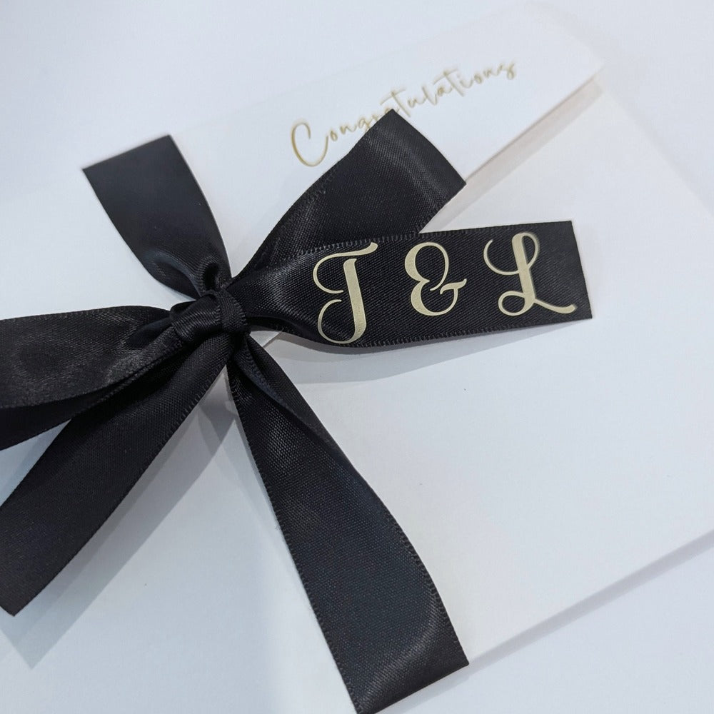 Personalised wedding money card for cash gift with J & L in gold letters