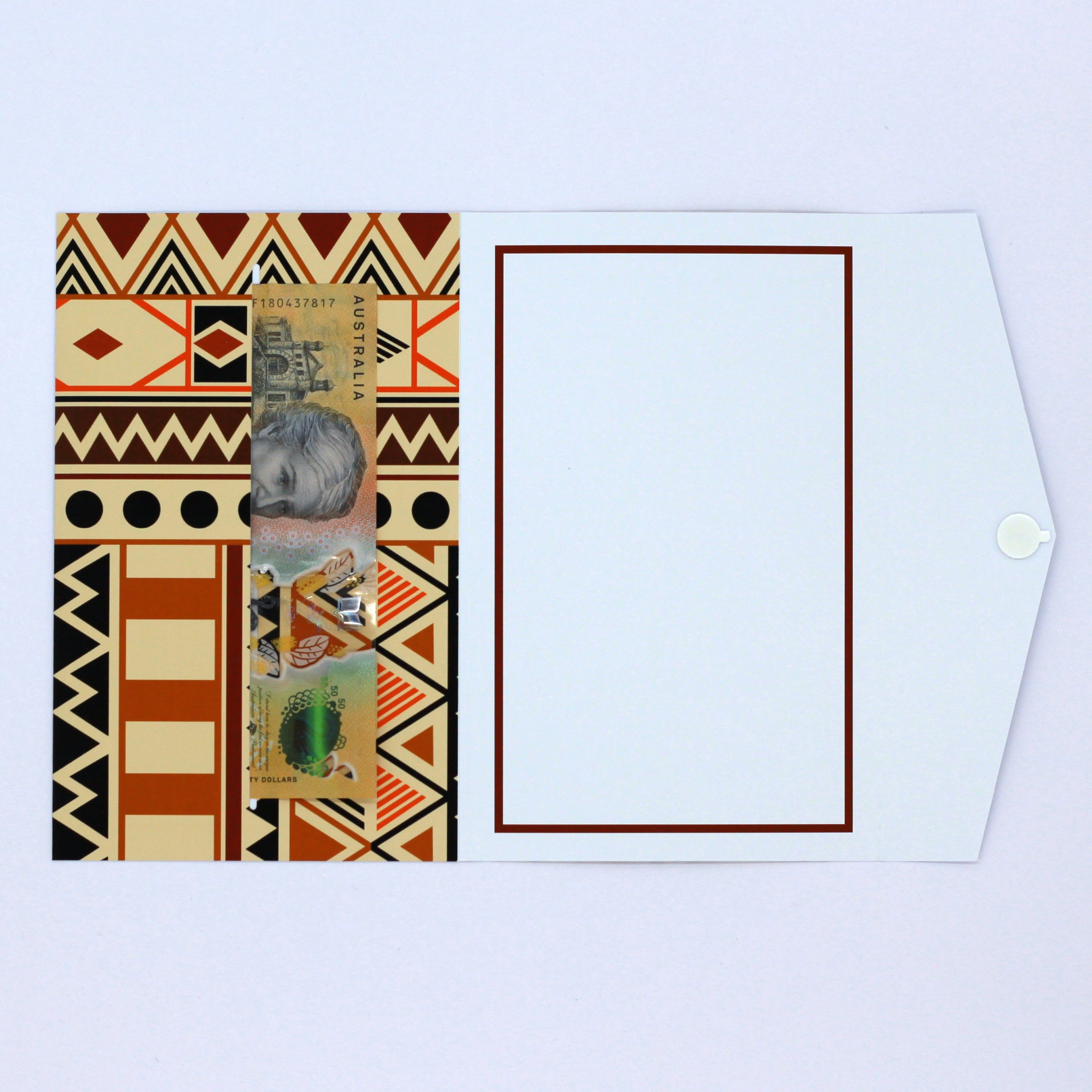 Inside Brown and Orange Polynesian tribal pattern money envelope with cash in pocket for giving cash