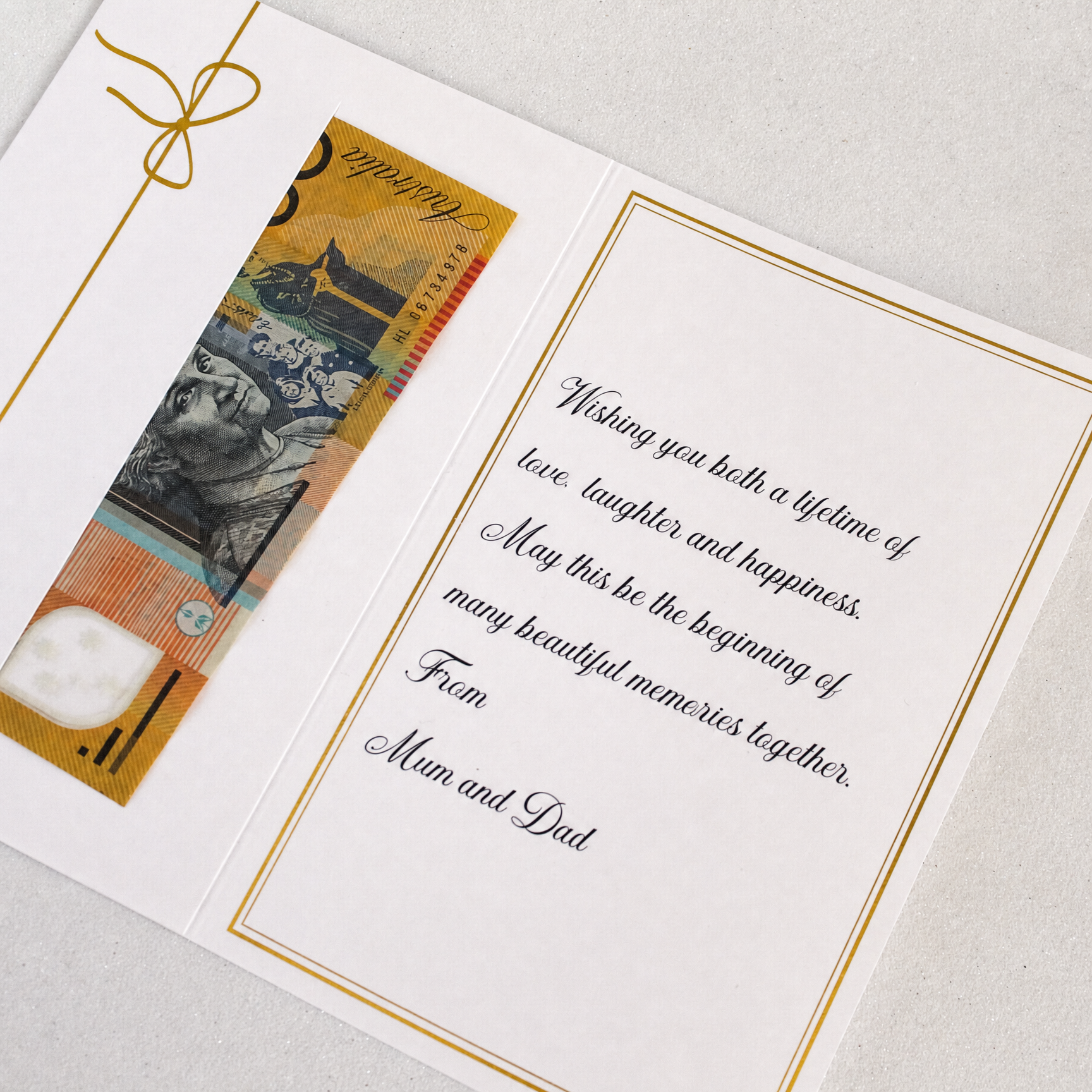 close up of wedding money envelope with cash in the card