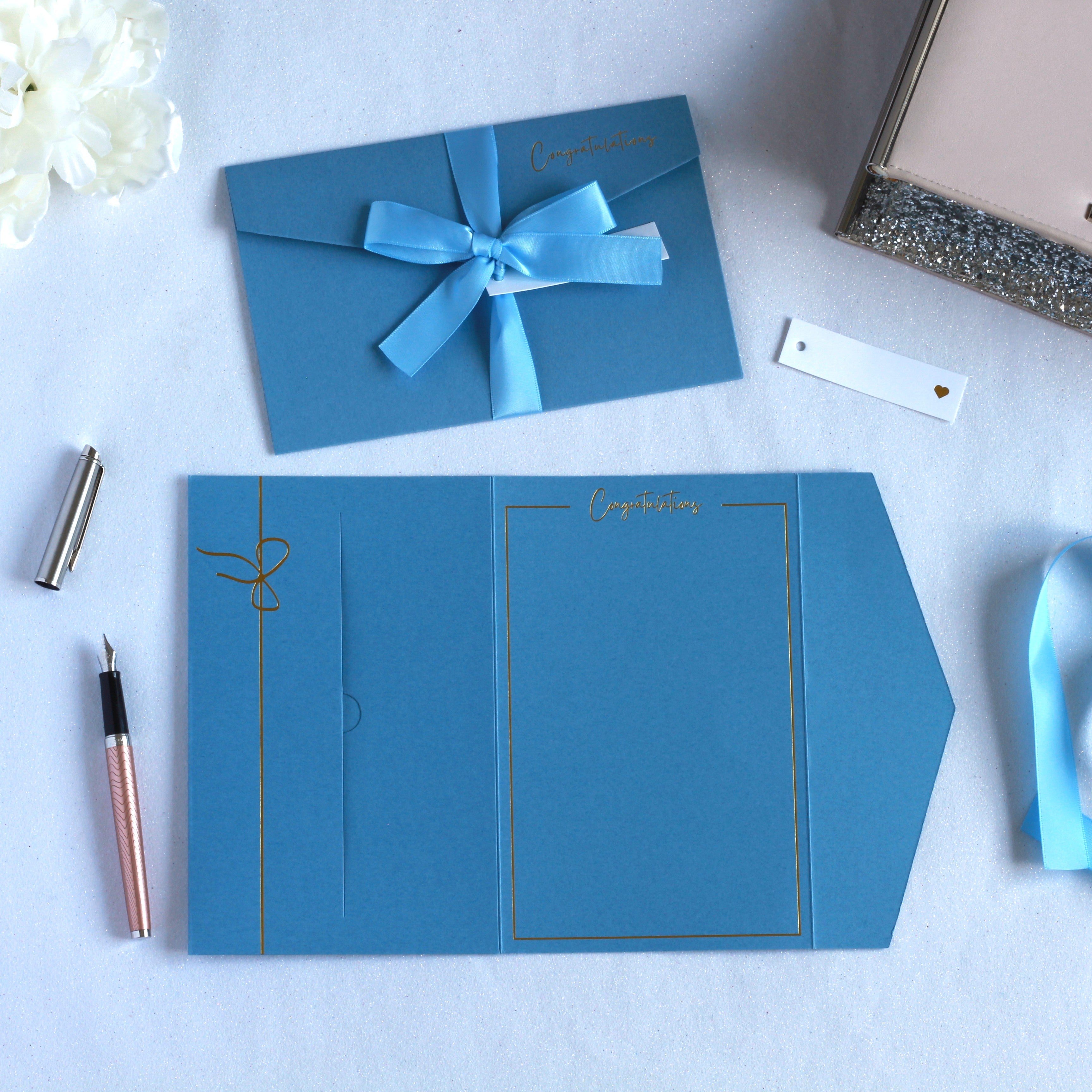 blue congratulations pocket greeting card with ribbon and tag