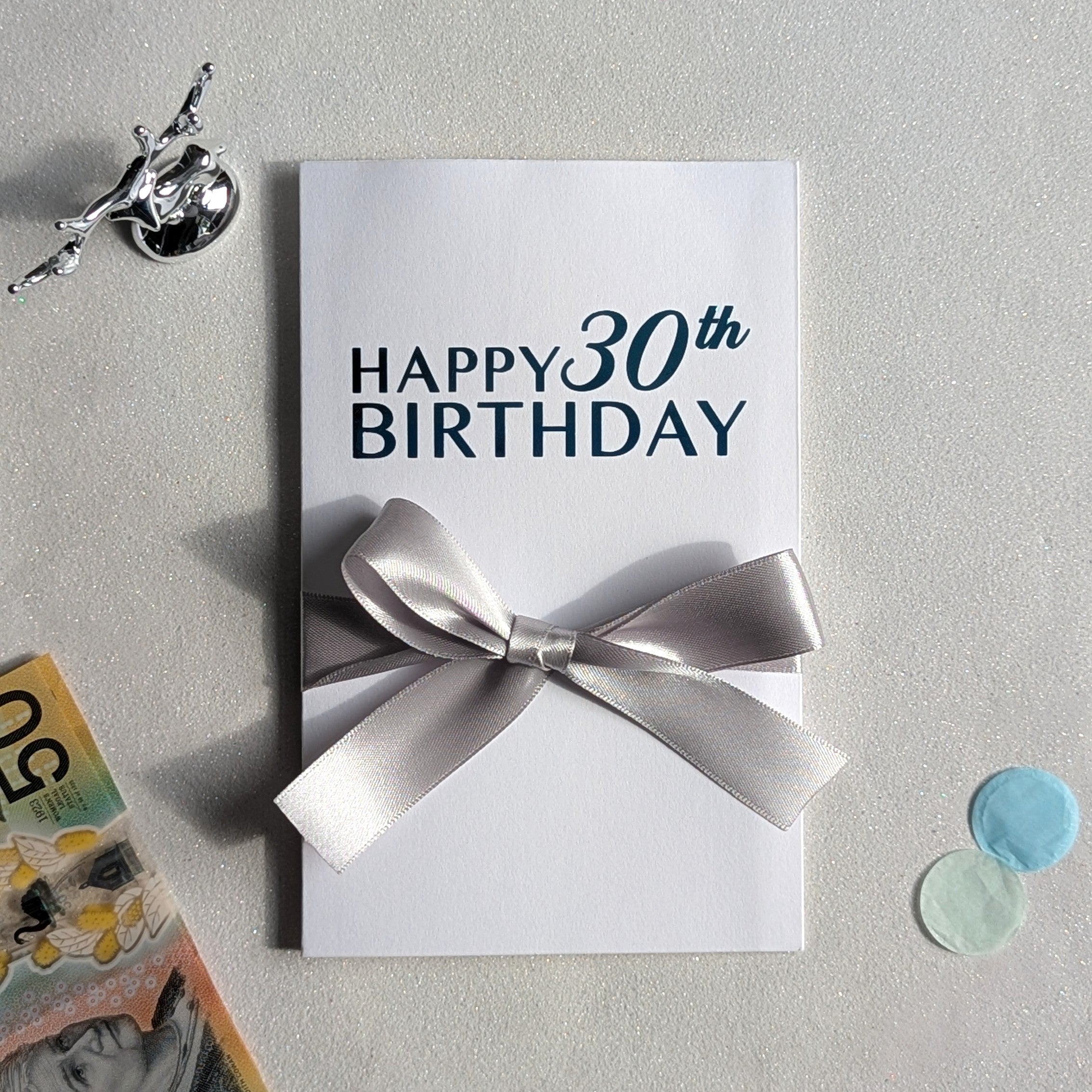 30th birthday card with money pocket for giving cash or gift voucher or gift card. Happy 30th birthday in blue vinyl with silver ribbon