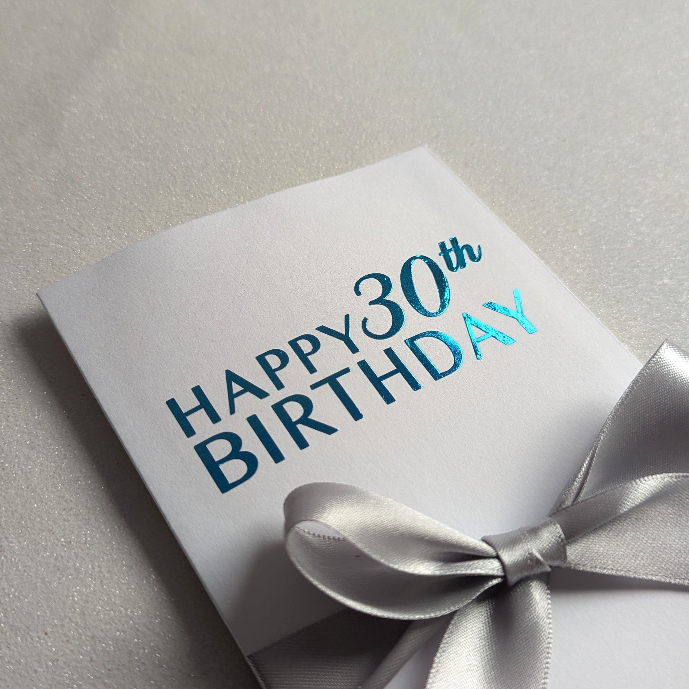 30th birthday money card with money pocket for giving cash or gift voucher or gift card. Happy 30th birthday in blue vinyl with silver ribbon