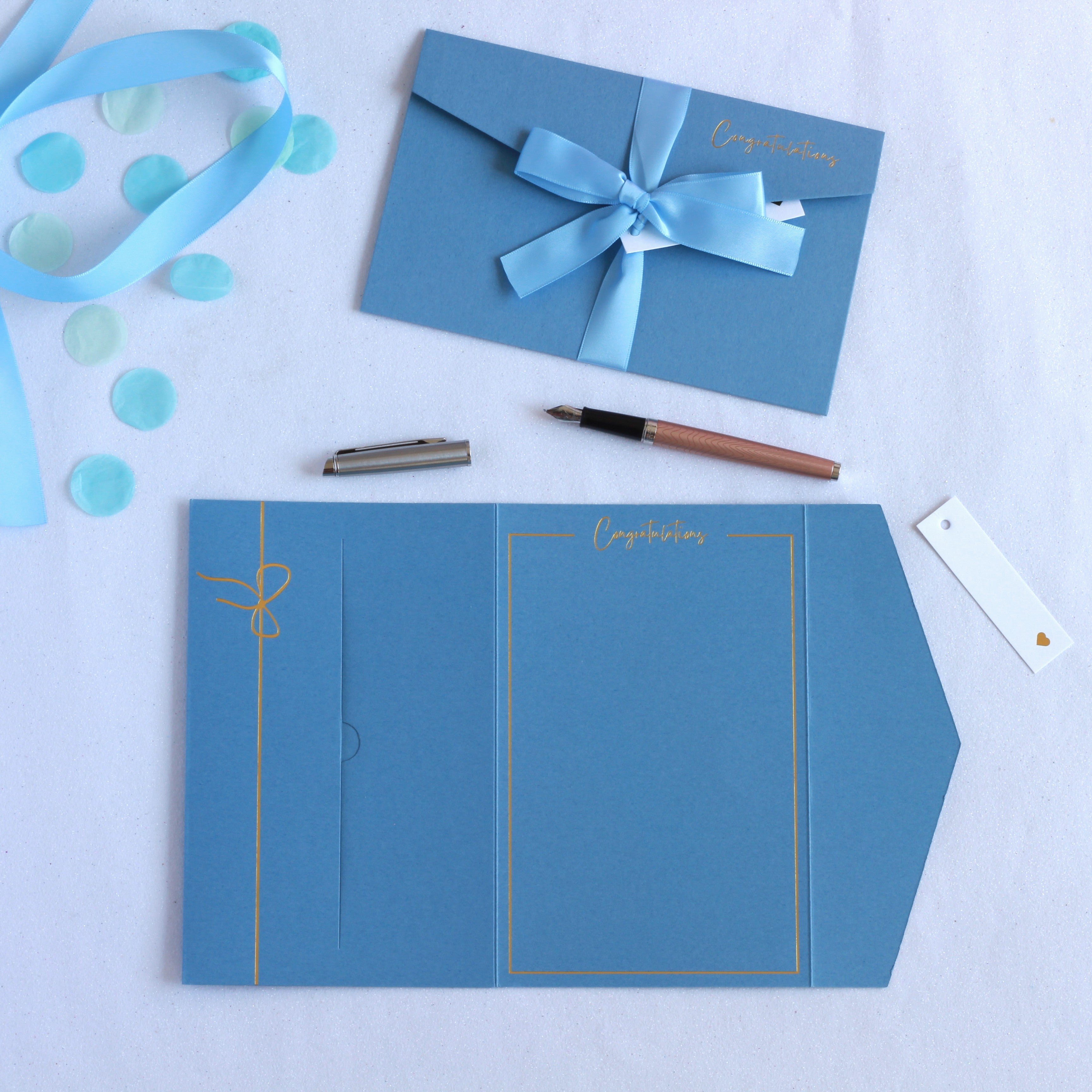 Blue pocket congratulations greeting card with ribbon and tag. Baby shower, graduation, money wallet, money card, money envelope