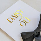 Personalised Luxury Wedding Money Envelope with daisy and oli personalised on the front of the card with black ribbon