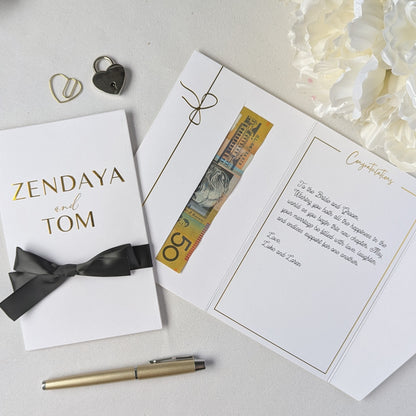 Personalised Luxury Wedding Money Envelope with personalised names on the front of the card with black ribbon and money gift in the gift wallet. Beautiful Wedding Card