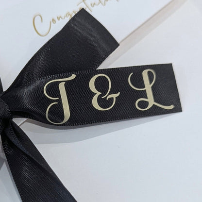 Next day delivery personalised card for giving money with name on the ribbon