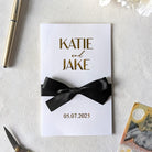 Elegant wedding  cash envelope with Katie and Jake and wedding date in gold foil with black ribbon
