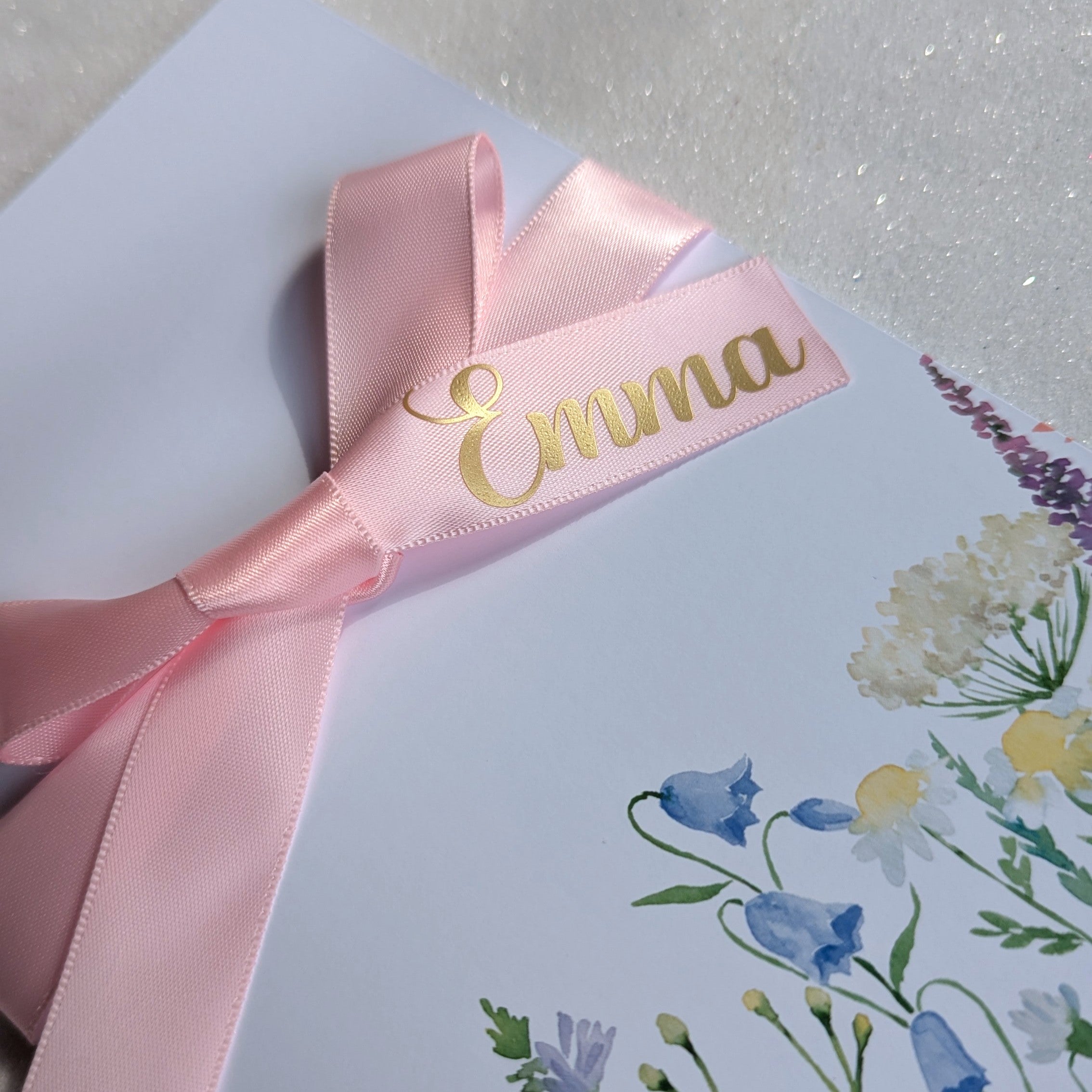 Floral Mothers Day card for gift voucher with personalised pink ribbon with Emma on it