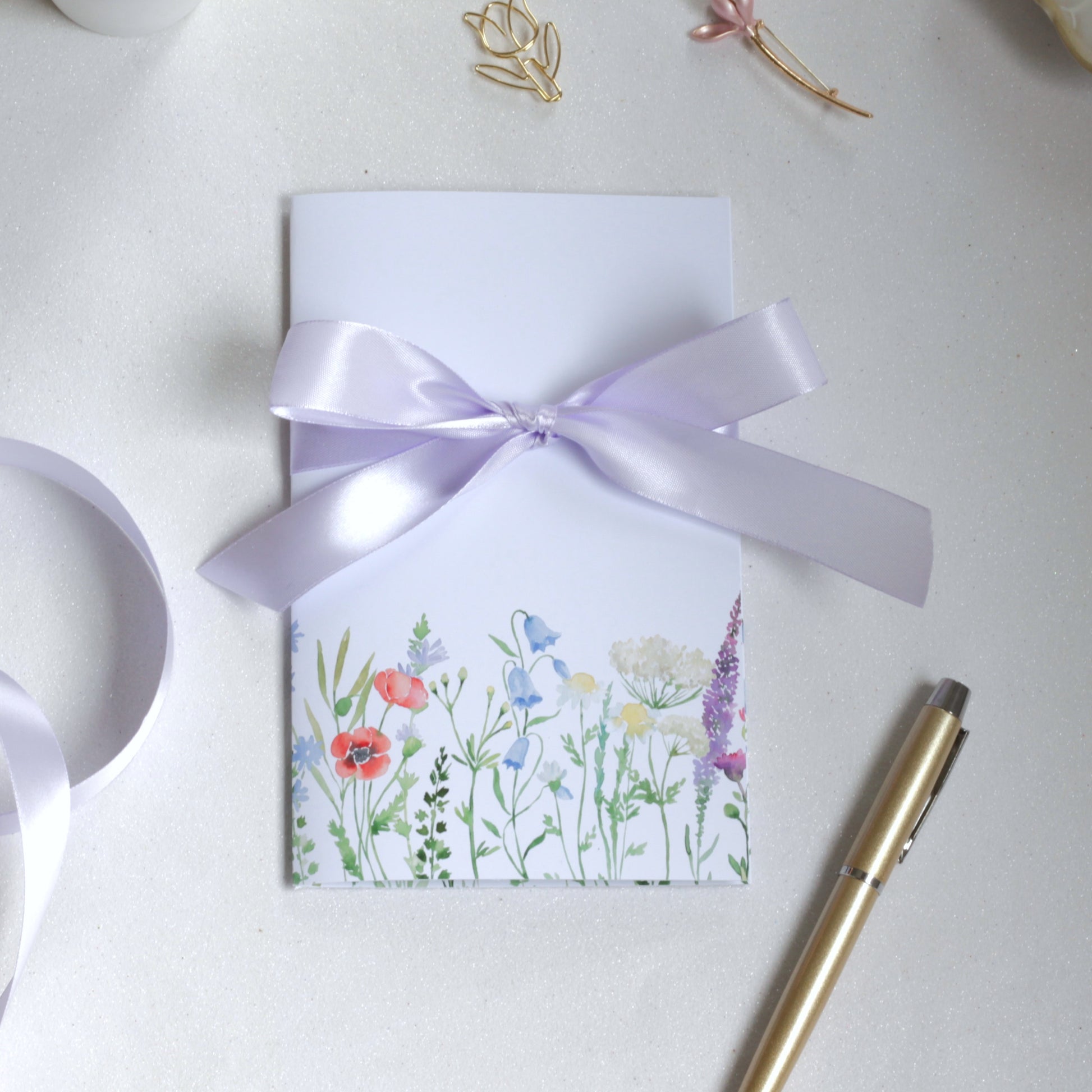 Floral all occasion money card outside purple ribbon