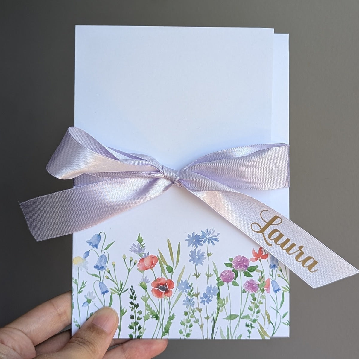 Front of floral watercolour womens gift voucher envelope