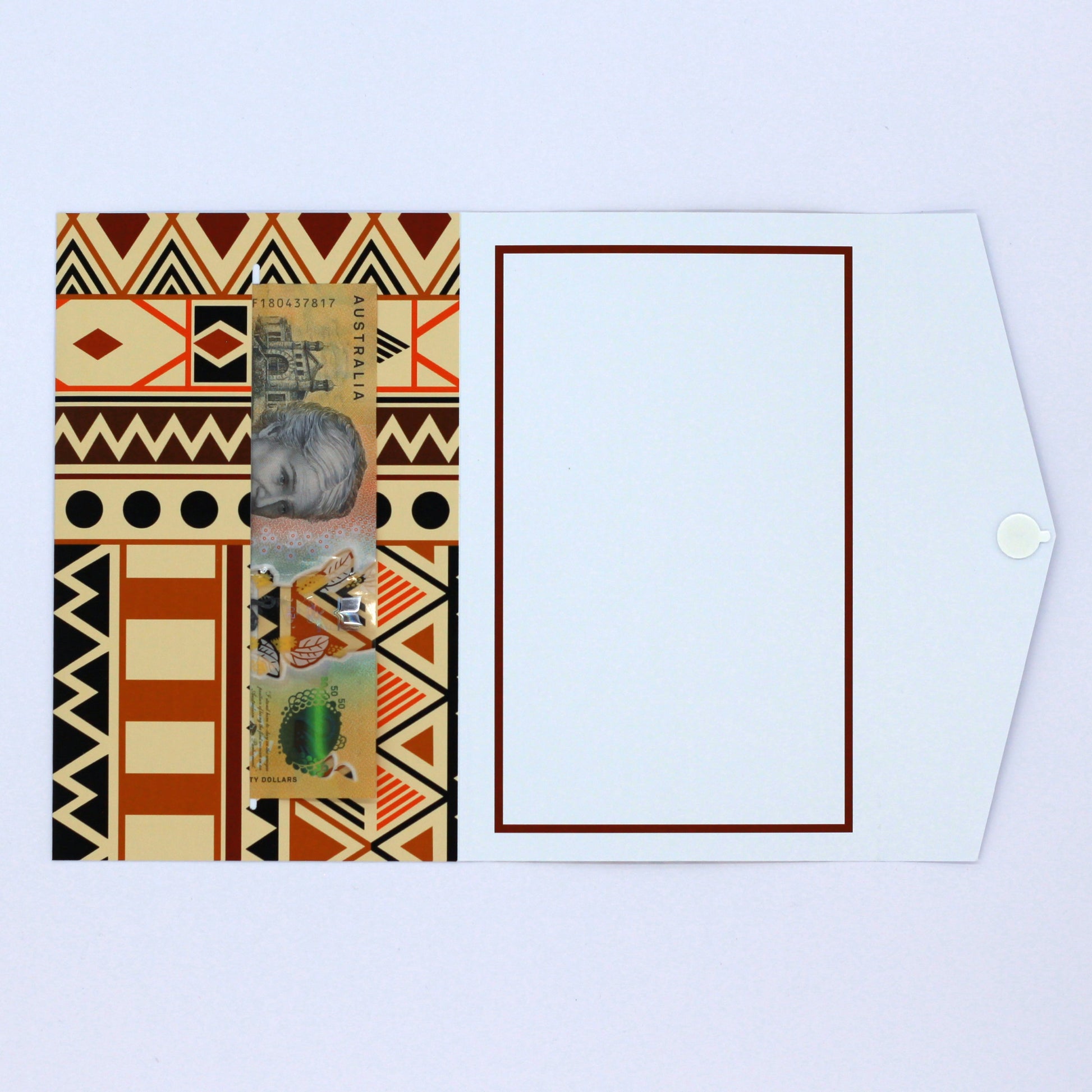 Inside Brown and Orange Polynesian tribal pattern money envelope with cash in pocket for giving cash
