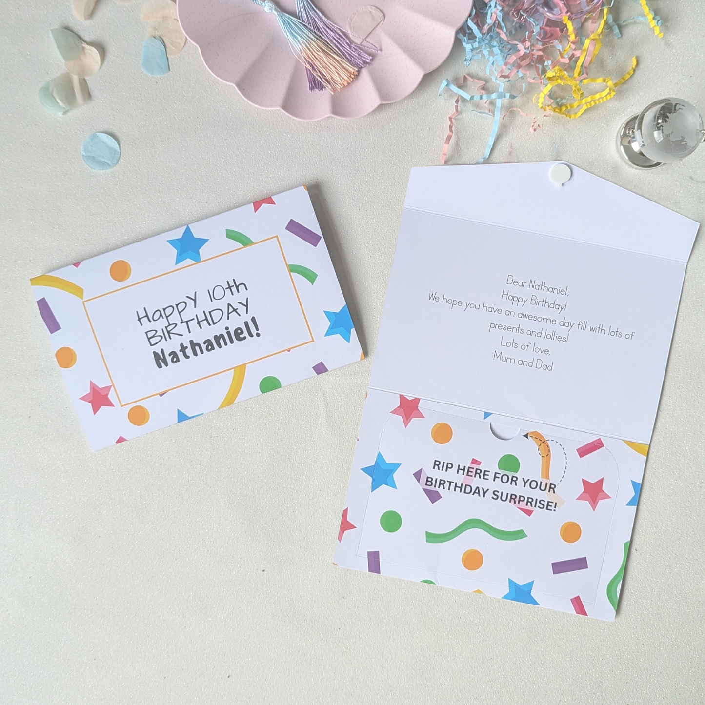 Personalised 10th birthday money pocket card featuring a colorful confetti design with the child's name. Includes a secure internal pocket for cash or gift cards.
