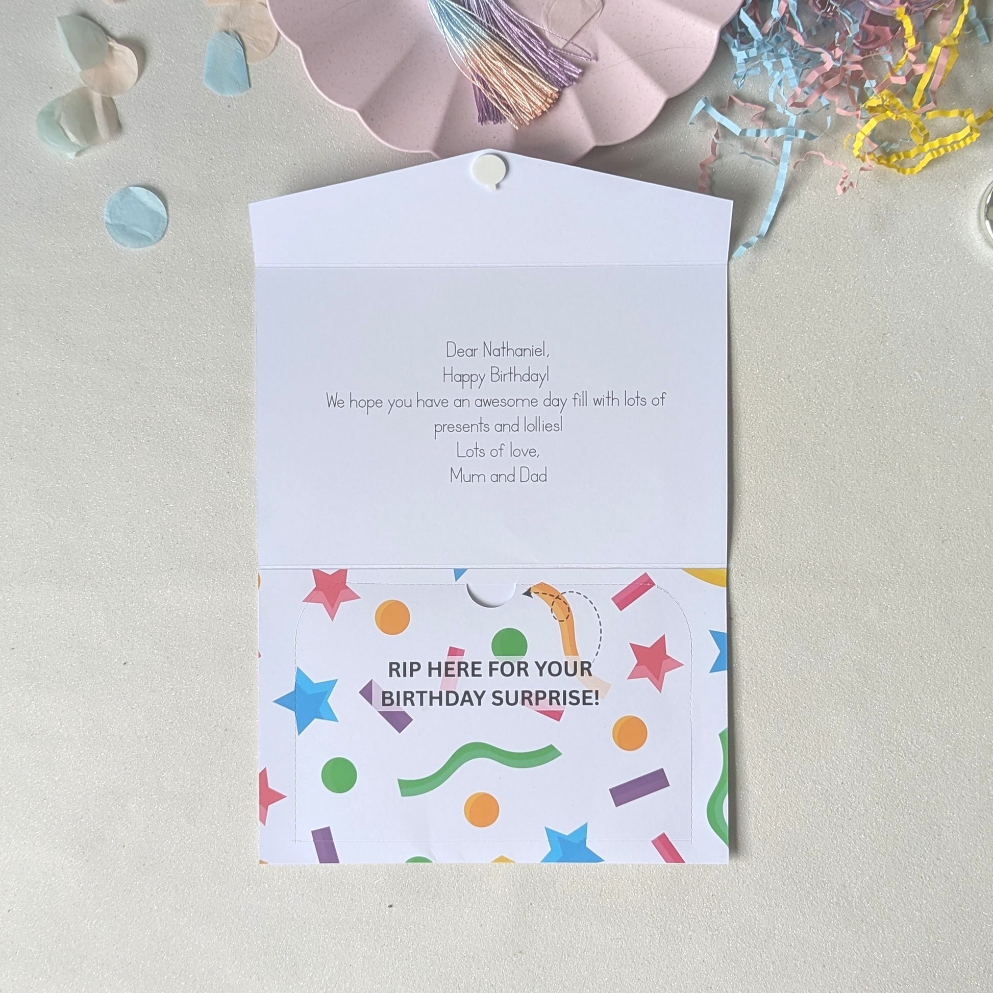 Personalised 10th birthday money pocket card featuring a colorful confetti design with the child's name. Includes a secure internal pocket for cash or gift cards.