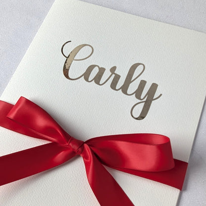 Large Personalised A4 greeting card with carly on the front and red satin ribbon