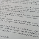 18 letters for 18 years archive quality felt paper and pigment ink clos up of text printed on the letter