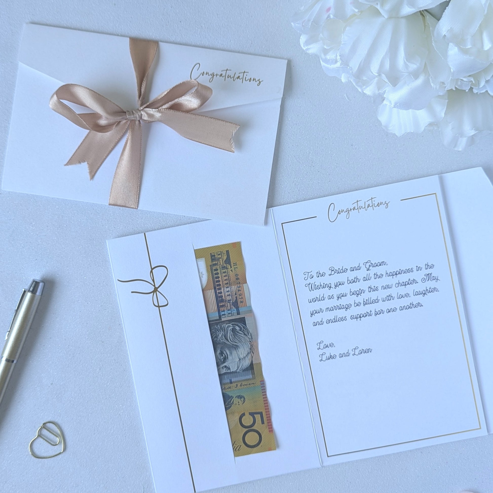 White wedding money gift envelope with gold satin ribbon