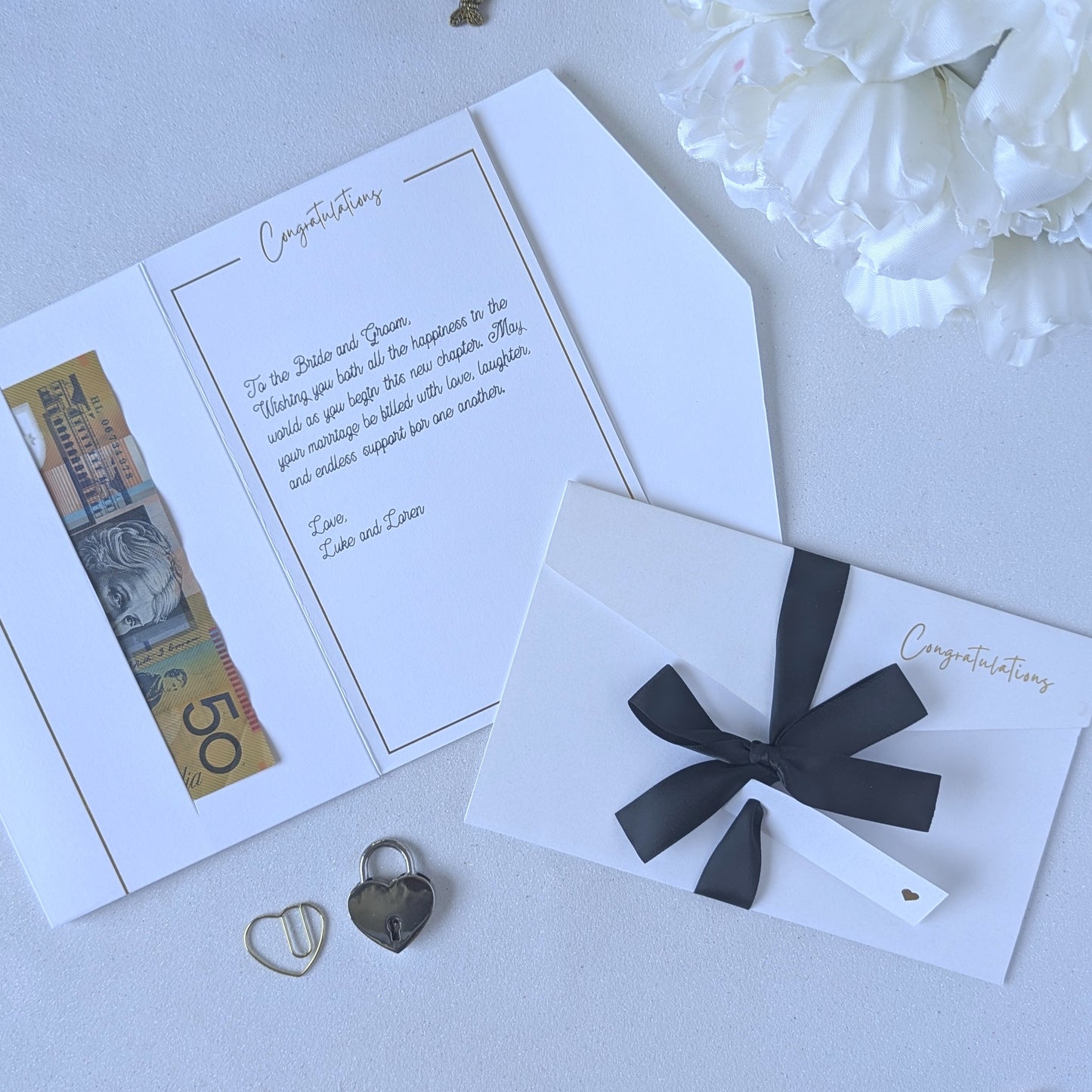 White wedding money gift envelope with black satin ribbon