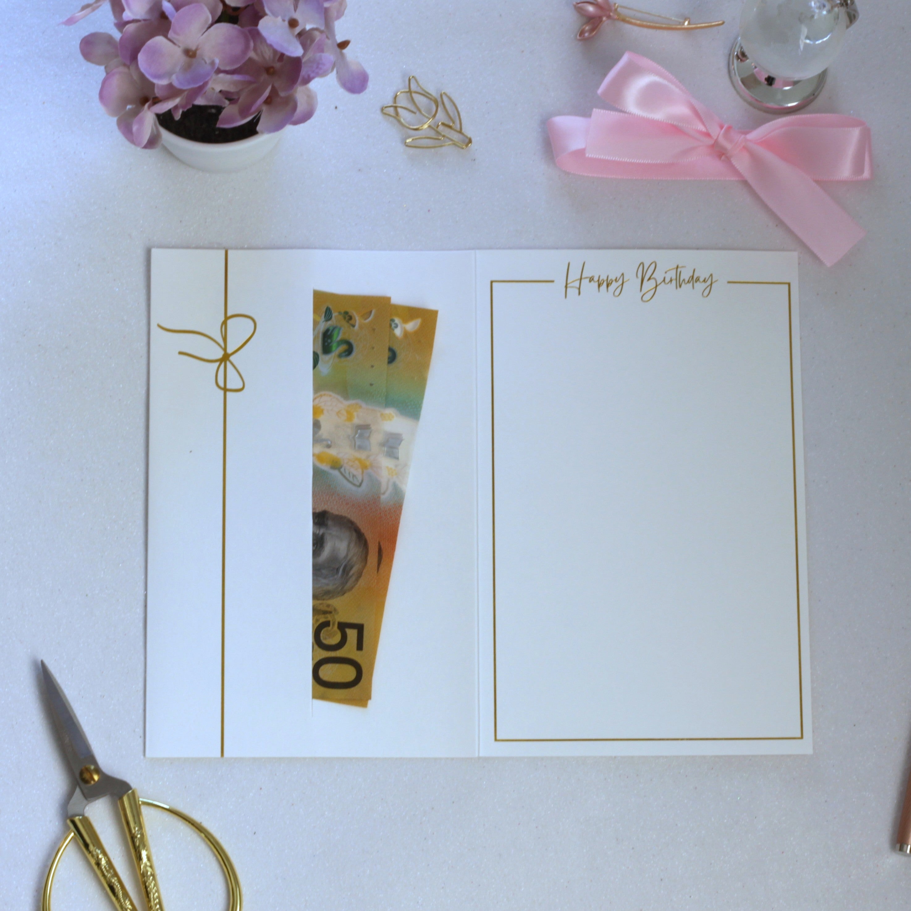 Inside of White birthday card with money pocket with money in the pocket