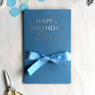 Blue Personalised Money Birthday card with blue ribbon with Happy Birthday Steve in Silver vinyl