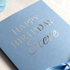 Blue Personalised Money Birthday card with blue ribbon with Happy Birthday Steve in Silver vinyl close up