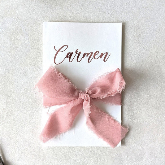 Personalised birthday money envelope white card with Carmen on the front in pink vinyl and pink ribbon
