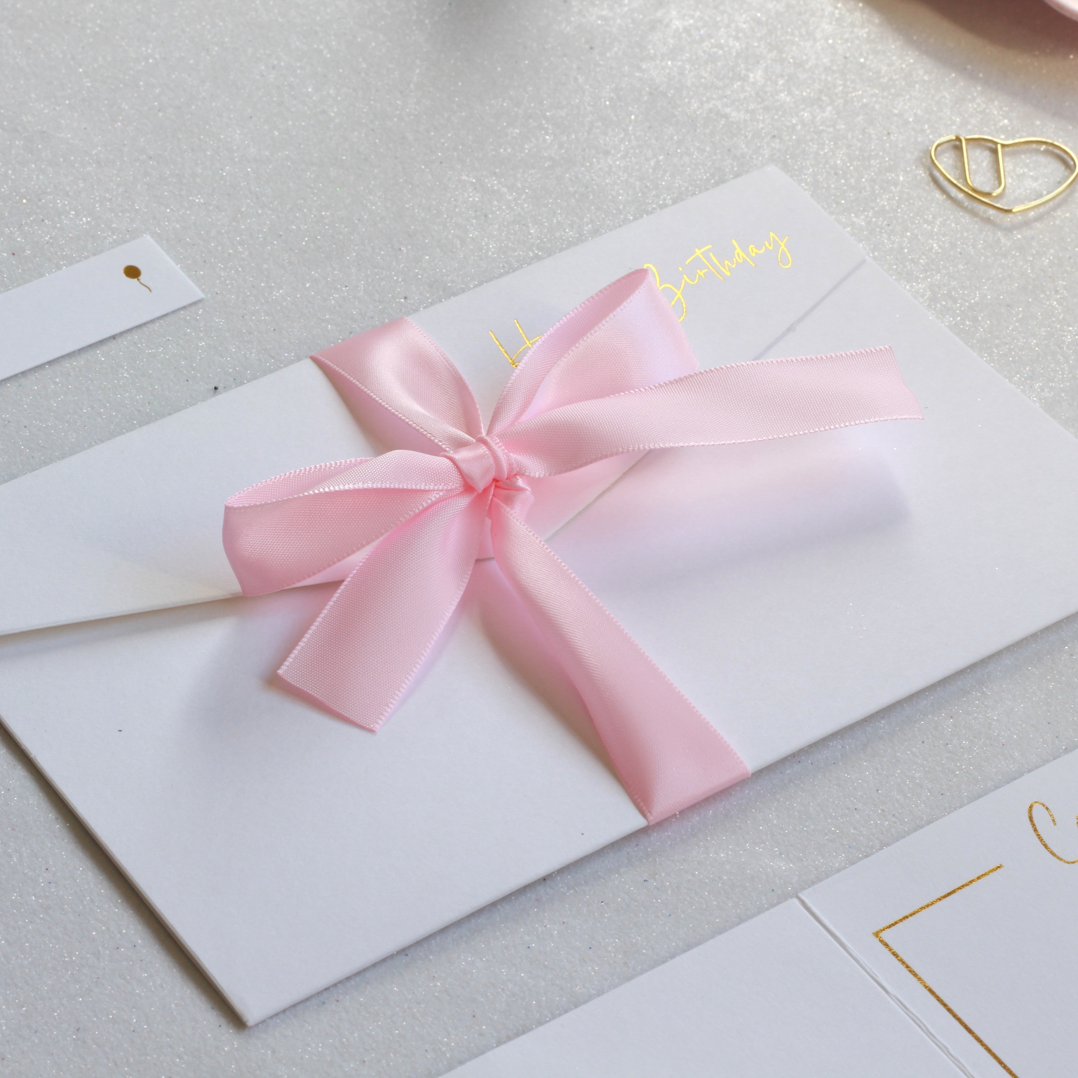 Personalised white happy birthday greeting card with pink ribbon for giving cash or gift voucher 