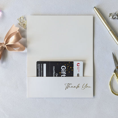 Beautiful Thank you gift envelope with gold ribbon with gift card in the gift pocket