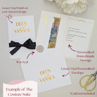 Example of The Couture Suite featuring hand-applied luxury gold vinyl on the card and envelope, a personalized ribbon, and a custom printed inside message.