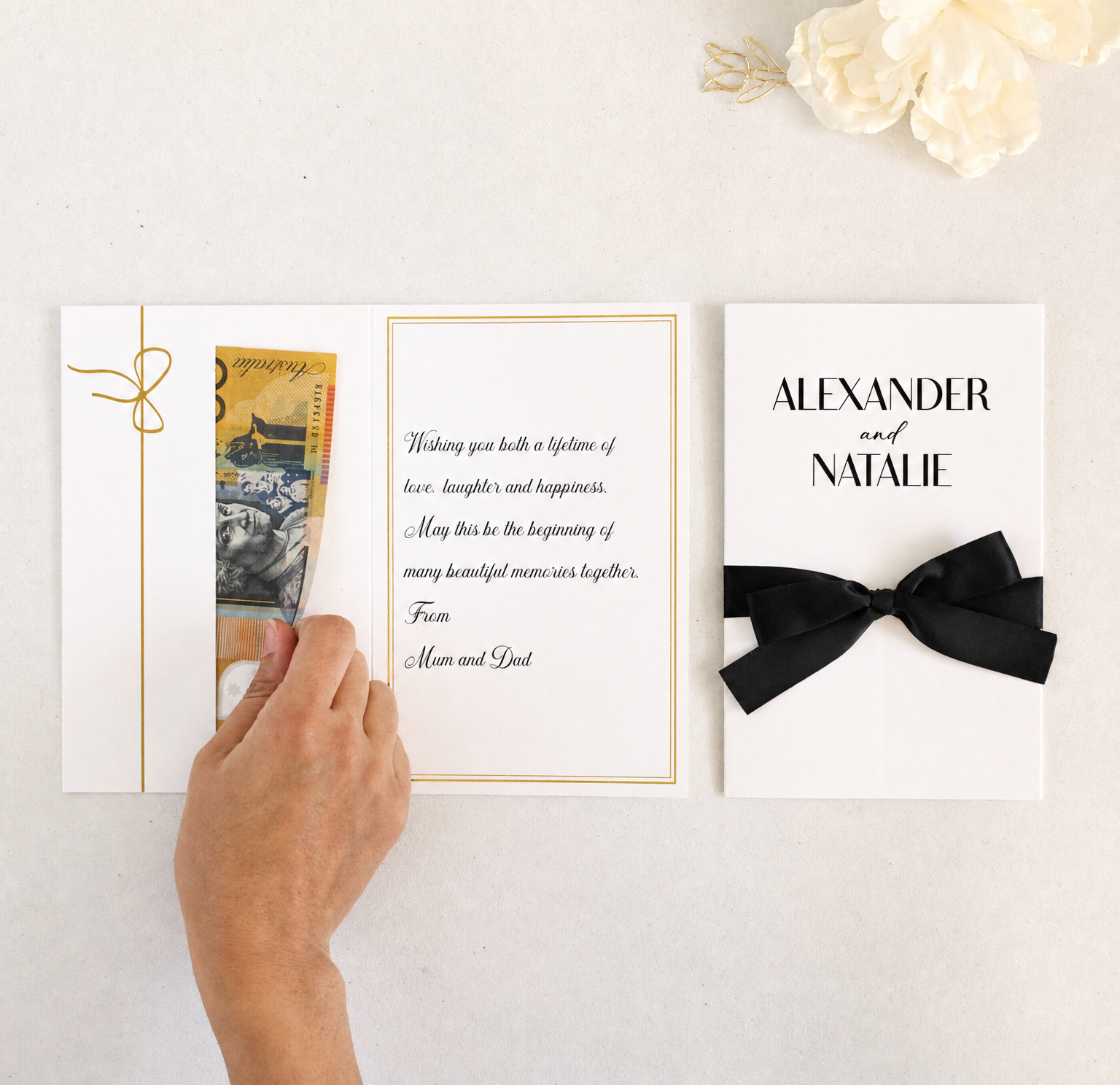 Wedding card with hand placing money in the pocket